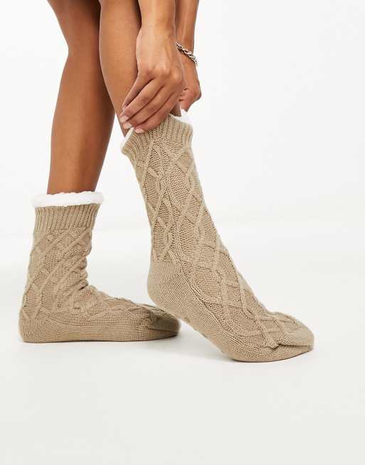 Loungeable cozy cable knit slipper socks in beige