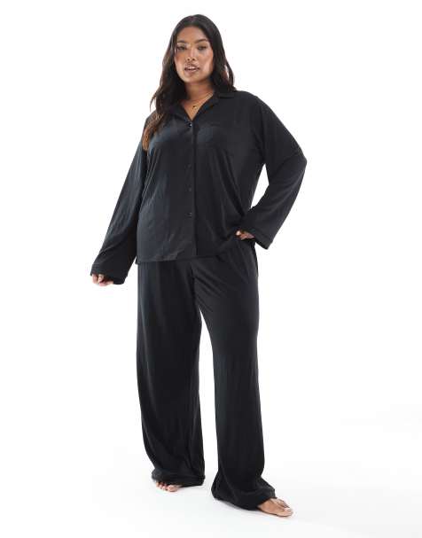 Loungeable Curve super soft jersey revere top and wide leg pyjama set with piping detail in black - view 1