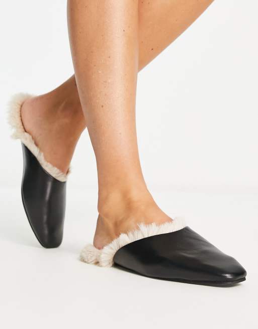 Loungeable faux fur lined PU mule slipper in black and cream ASOS