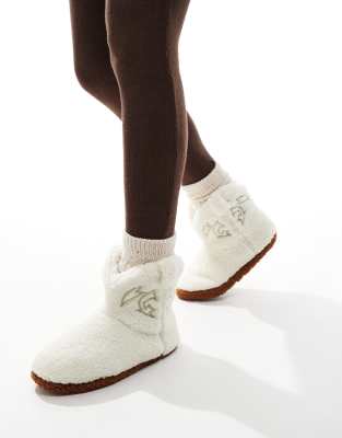 Loungeable - Hausschuh-Stiefel im Cowboy-Design aus Teddyfell in Cremeweiß
