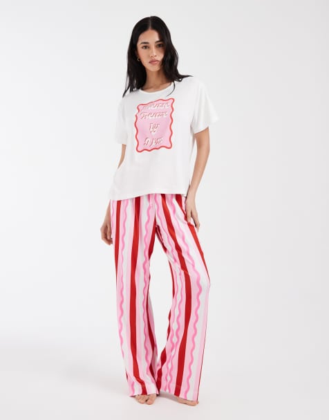 Loungeable 'leave by 9pm' graphic t-shirt and jersey trouser pyjama set in pink stripe - view 1