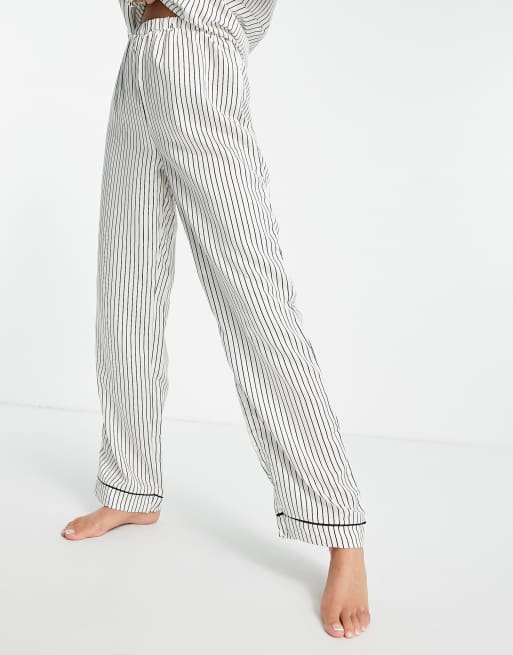 Loungeable - Pantaloni del pigiama in raso color crema e nero gessato in coordinato
