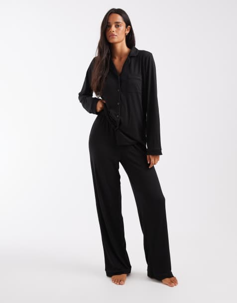 Loungeable super soft jersey camp collar top and wide leg pants pajama set with piping detail in black - view 1