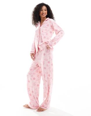 Loungeable Loungeable super soft jersey revere top and wide leg pyjama set with piping detail in cowboy print-Multi