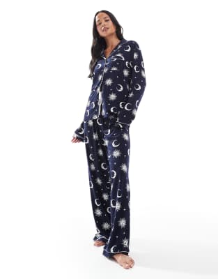 Loungeable super soft jersey revere top and wide leg pyjama set with piping detail in navy celestial print