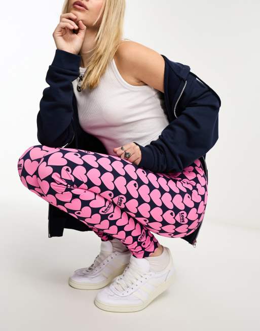 Love Moschino all over heart pattern leggings in pink