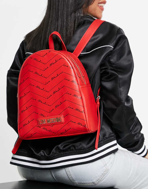 Love Moschino all over logo backpack in red