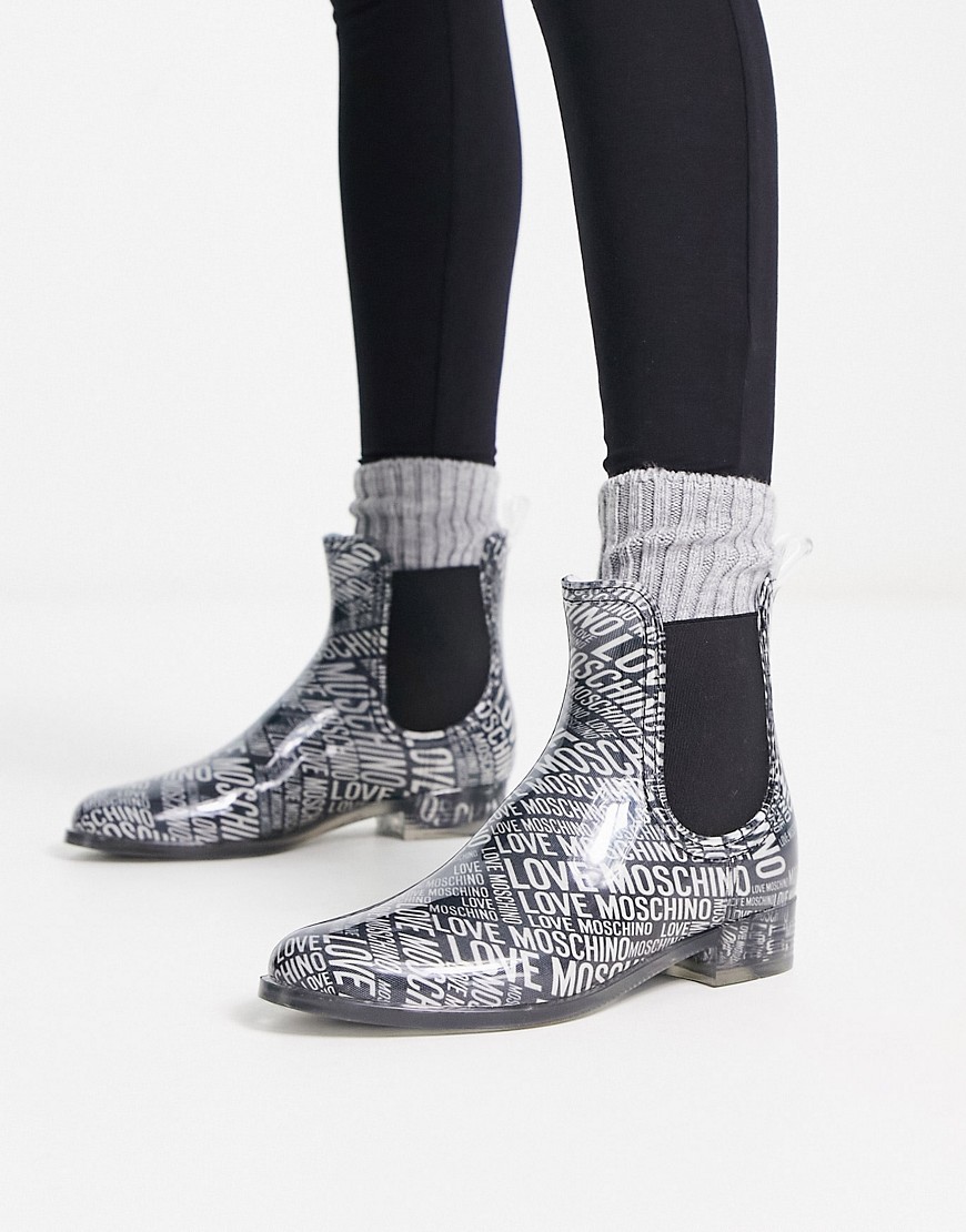 Love Moschino all over logo boots in silver