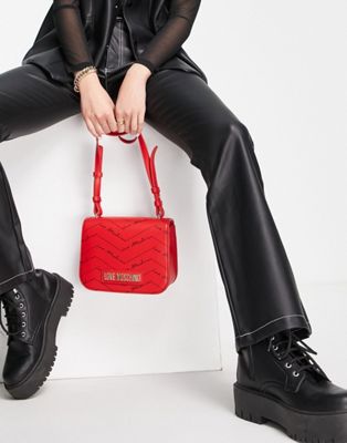 Love Moschino all over logo crossbody bag in red