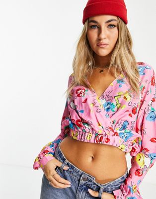 Love Moschino allover floral cropped blouse in pink