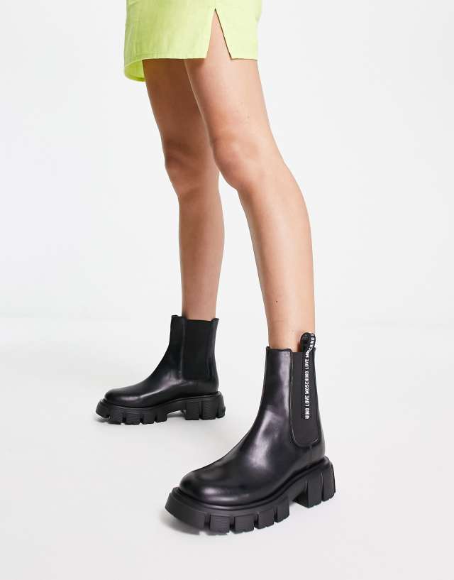 Love Moschino chelsea boots with logo tape in black