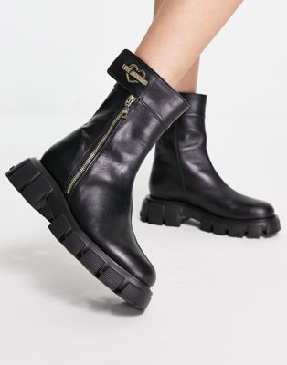 Love Moschino chunky ankle boots with gold heart in black - ASOS Price Checker