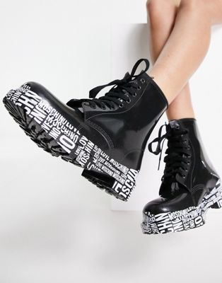Love Moschino chunky lace up boots with logo sole in black
