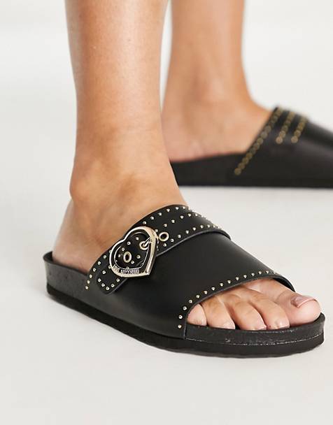 17 % de réduction Leather sandals Love Moschino en coloris Noir Femme Chaussures plates Chaussures plates Love Moschino 