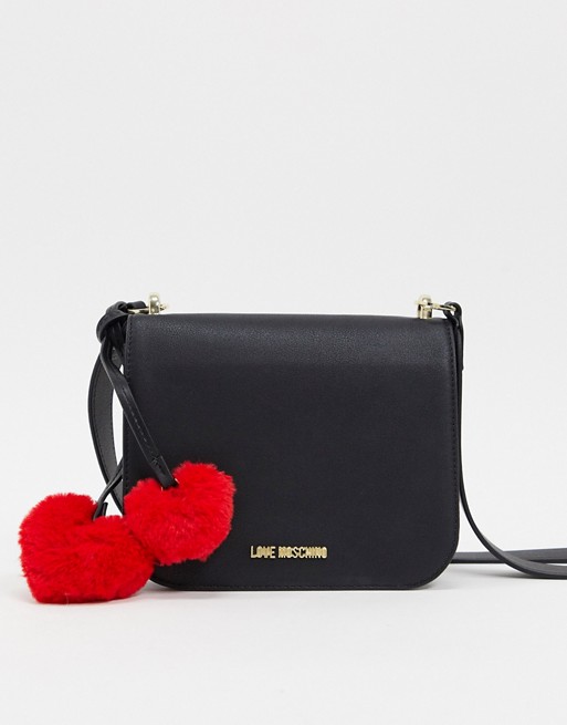 Love Moschino cross body bag with faux fur heart detail in black