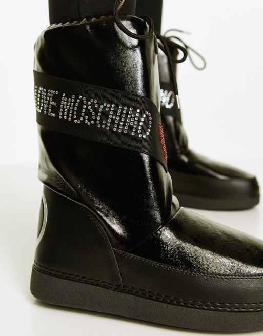 Moon boot discount moschino romania