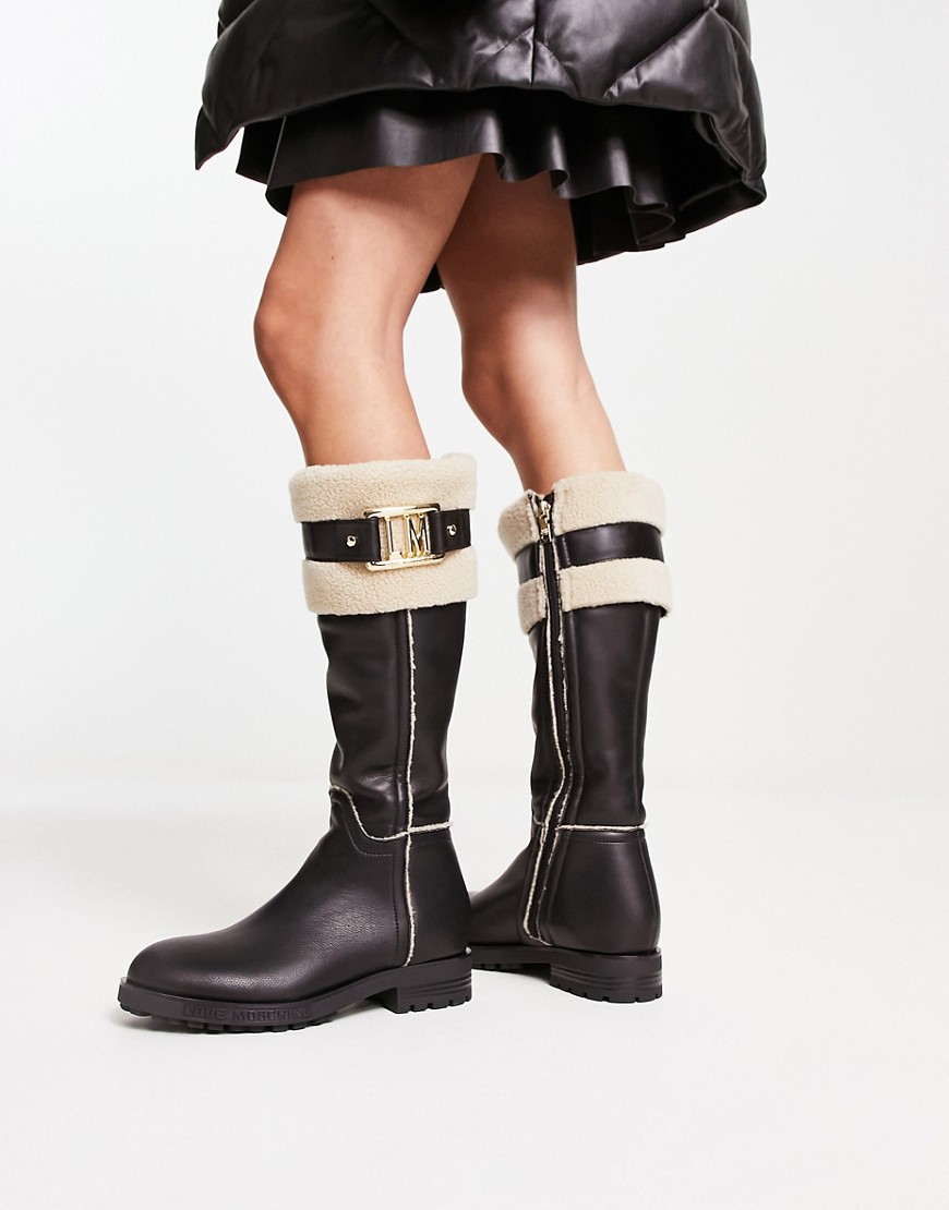 Love Moschino faux fur trimmed knee boots in black and cream