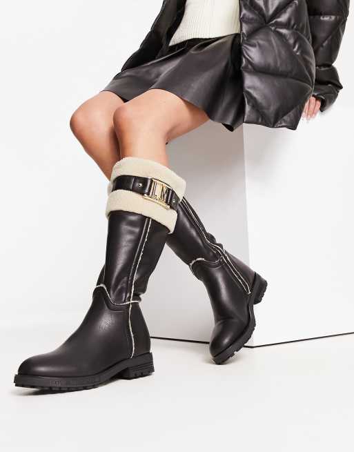 Love Moschino faux fur trimmed knee boots in black and cream ASOS