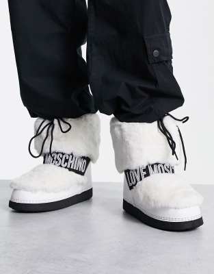 Love moschino hot sale fur boots