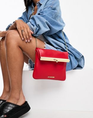 Love Moschino fold over cross body bag in red