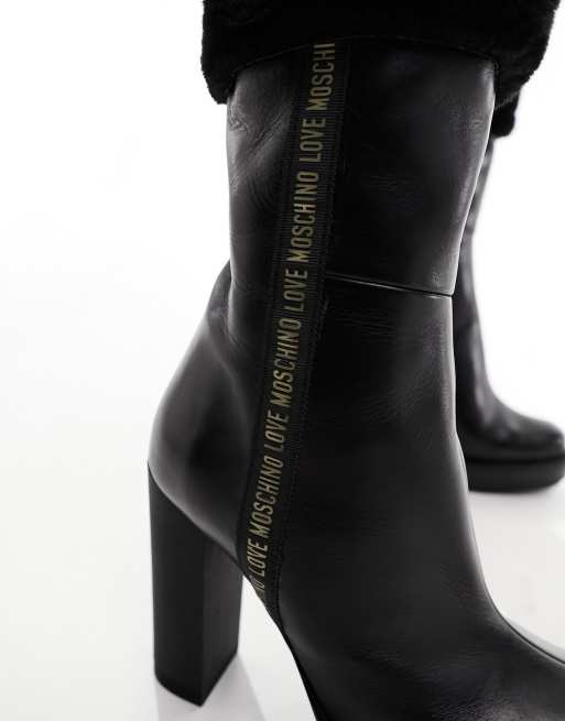 Love Moschino fur trim heeled boots in black ASOS