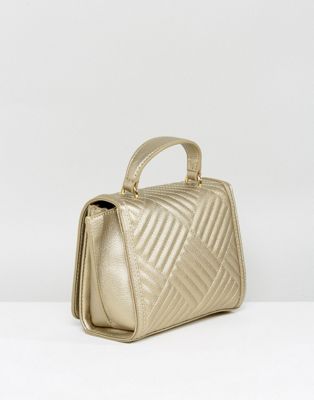 gold moschino bag