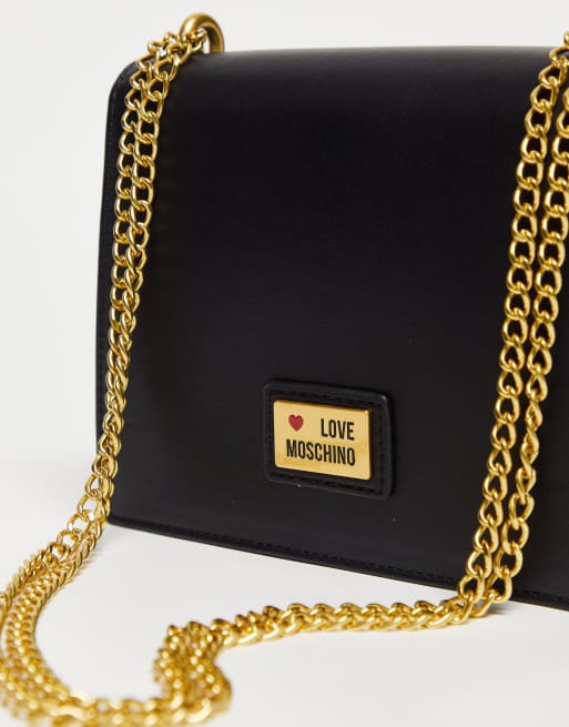 Love Moschino heart clasp cross body bag in black