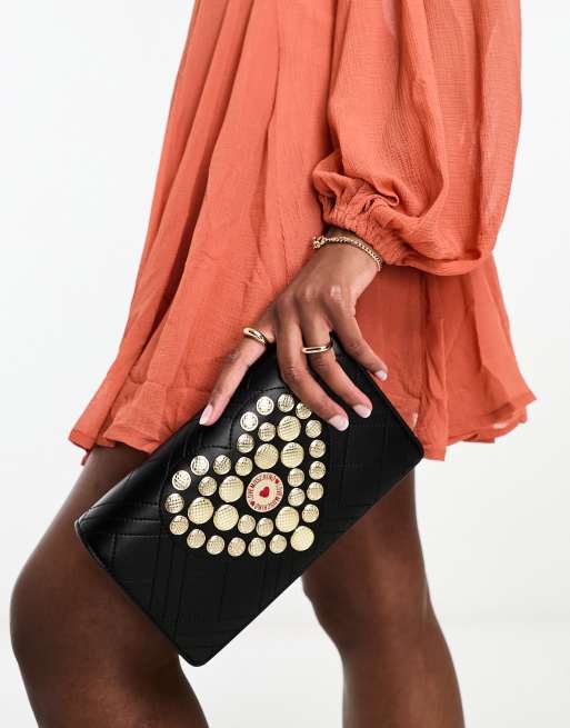 Love Moschino heart embellished clutch in black | ASOS