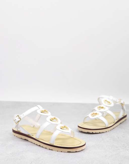 Love Moschino heart flat sandals in white ASOS