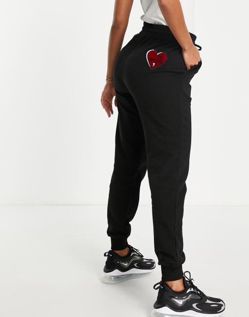 Love hot sale moschino joggers