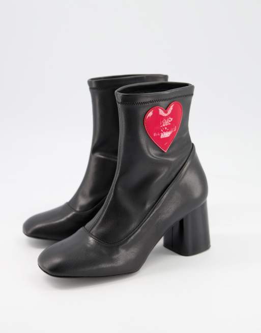 Love Moschino heeled sock boots with heart in black ASOS