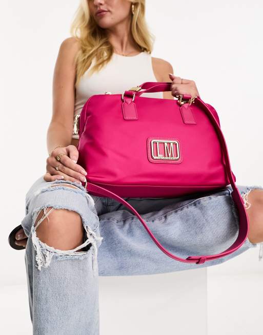 Love Moschino – Jaskraworóżowa torba podróżna