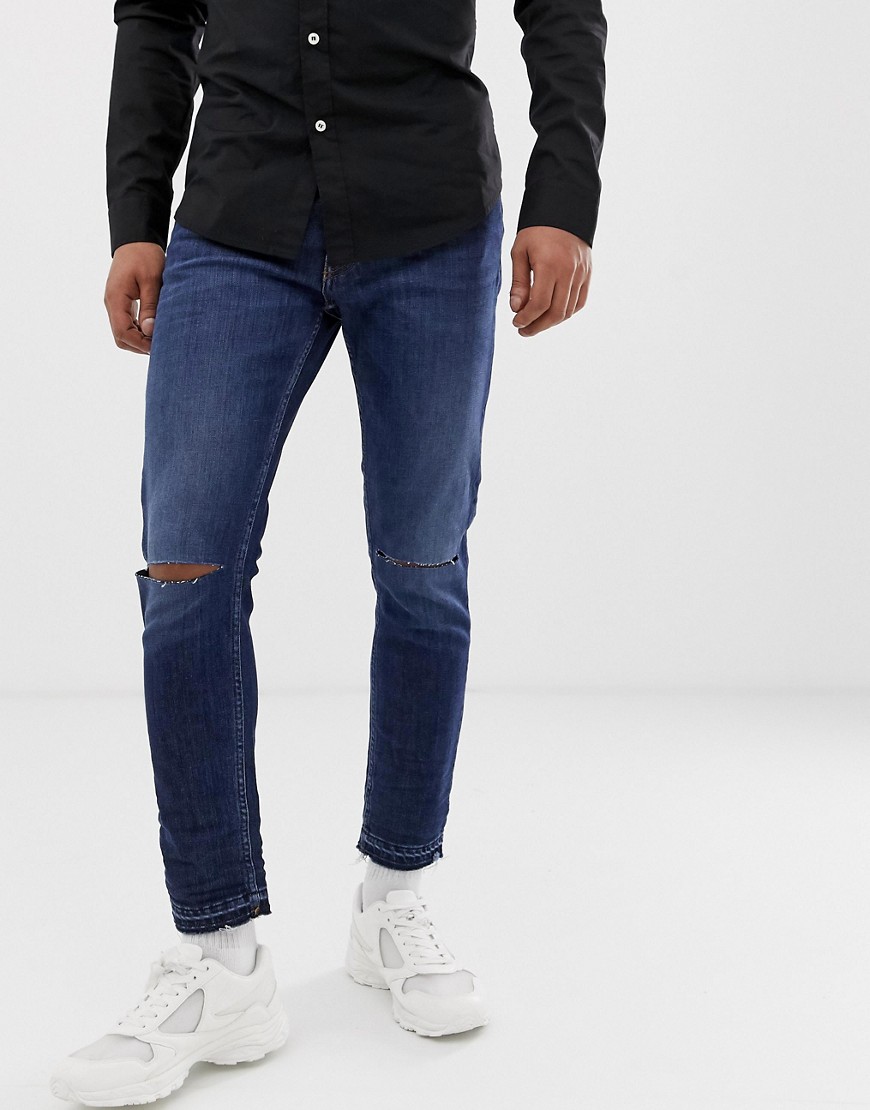 Love Moschino - Jeans skinny strappati con etichetta con logo sul retro-Blu