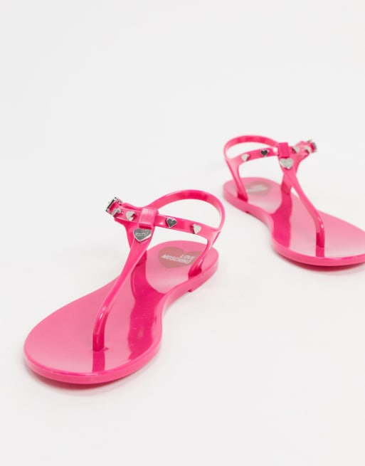 Love Moschino jelly flat sandals in pink ASOS