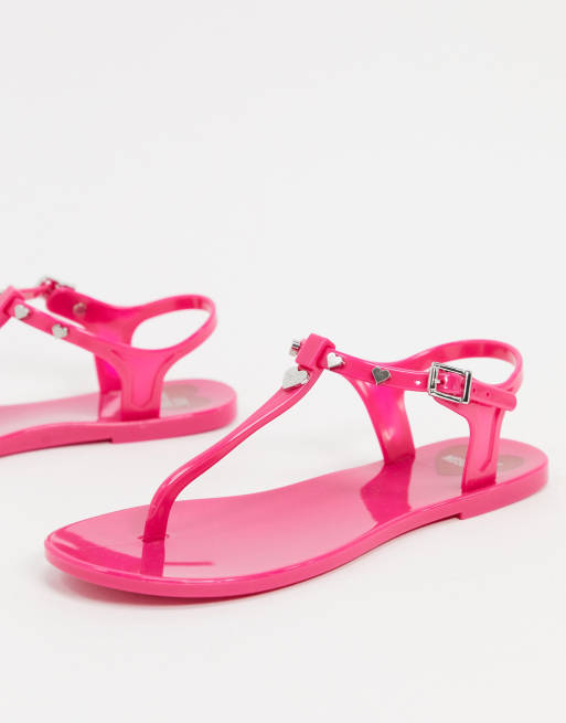 Love Moschino jelly flat sandals in pink ASOS