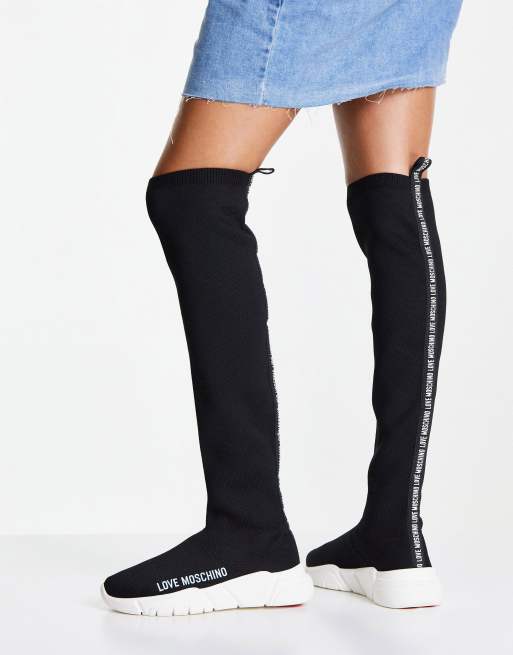 Love Moschino knee high sock boot in black ASOS