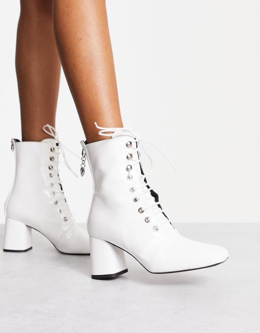 Love Moschino lace up boots with zip back in white | ASOS