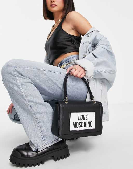 Love Moschino large logo top handle crossbody bag in black