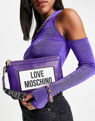 Love Moschino large logo wrist strap clutch bag in purple