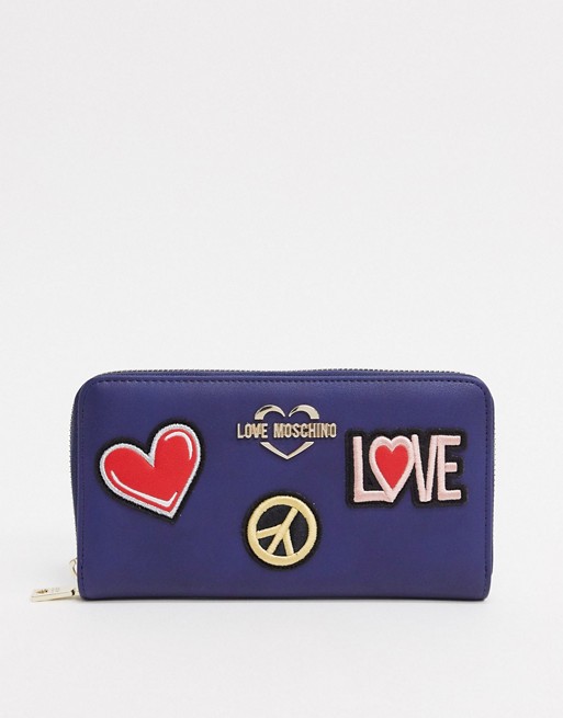 Love Moschino large purse with patches in navy