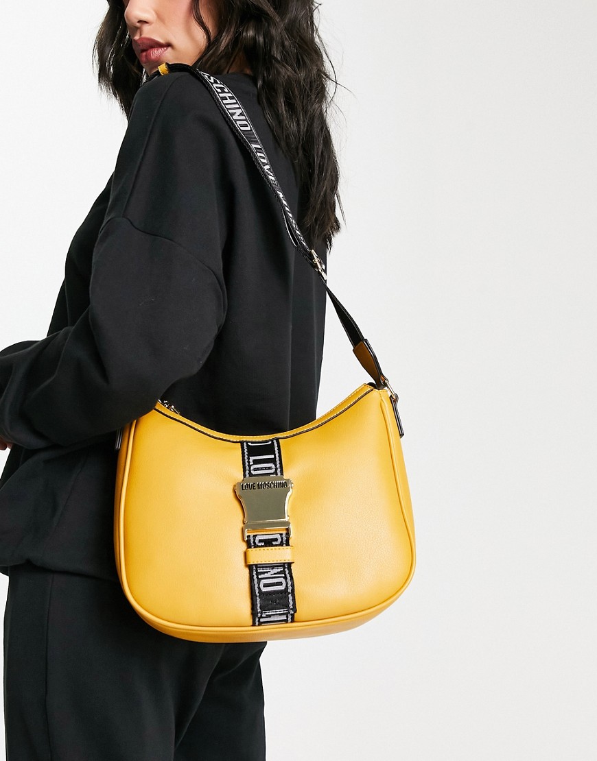 Love Moschino Logo Buckle Detail Zip Top Crossbody Bag In Ochre-Yellow