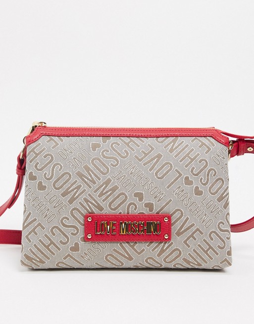Love Moschino logo jacquard cross body pouch bag in red