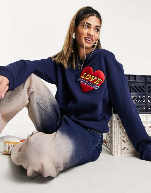 Love Moschino logo patch sweatshirt in blue ASOS