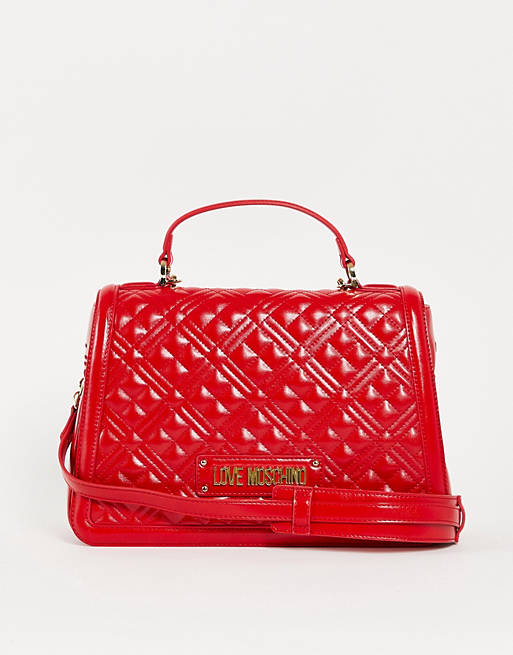 Love Moschino logo quilted top handle crossbody bag in red