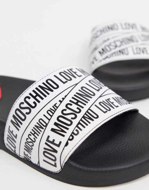 Love Moschino logo sliders in white