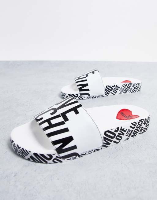 Love Moschino logo sliders in white ASOS