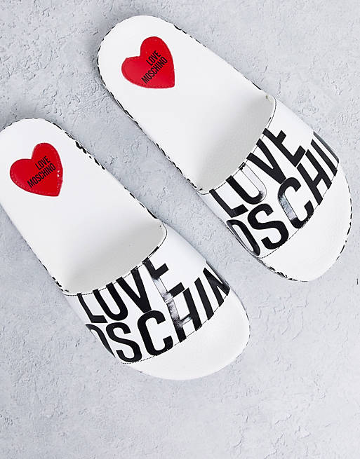 Love Moschino logo sliders in white