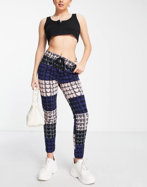 Love Moschino LoveLove logo joggers in pink multi