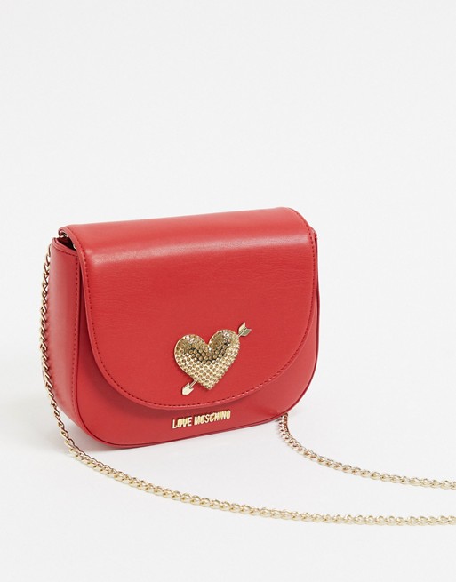 Love Moschino mini cross body bag with heart hardware in red