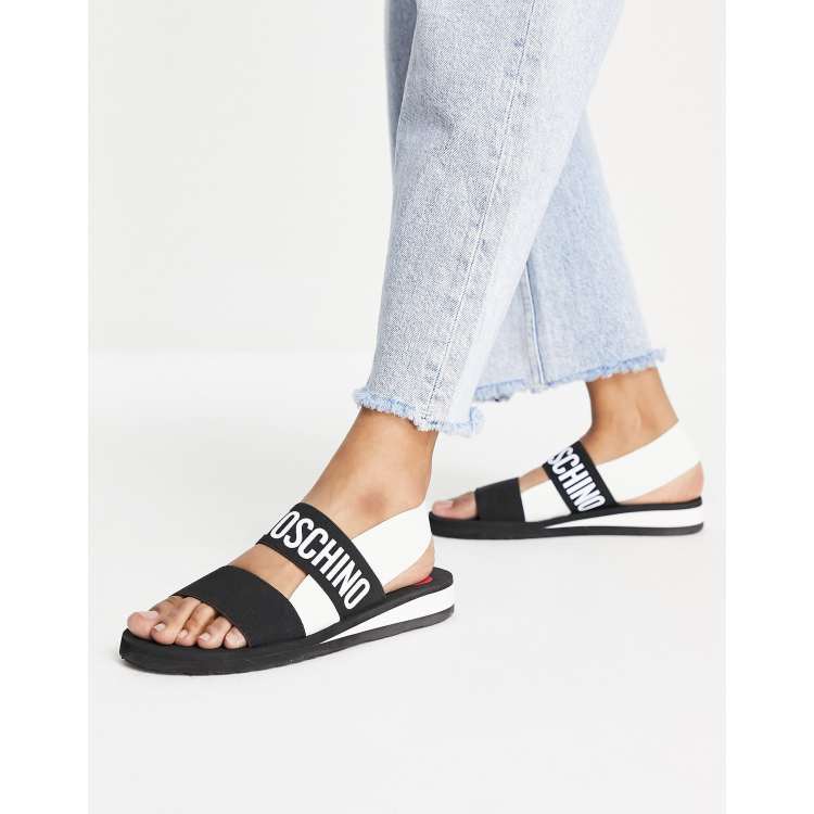 Diverse Fiasko Bliv såret Love Moschino mono elastic sandals in black | ASOS